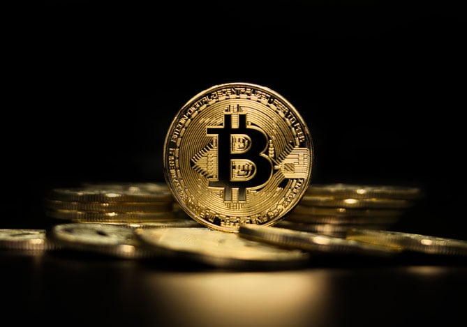 Mercado Pago: Imagem ilustrativa de moeda digital sugerindo o halving do Bitcoin